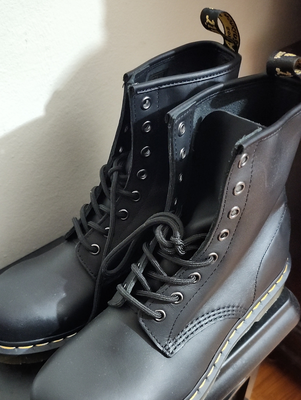 Dr. Martens Black Leather Combat Boots with Yellow Stitching